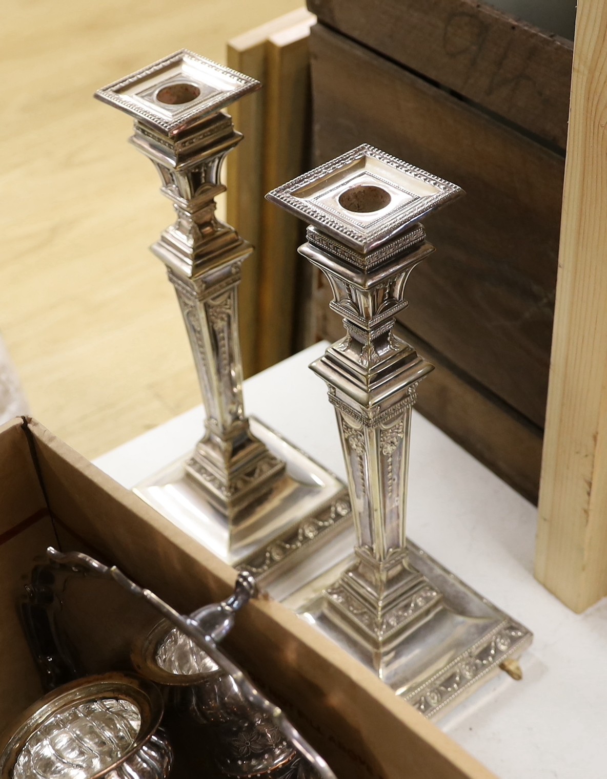 A pair of Adam revival silver plated candlesticks and mixed plated wares, candlesticks 33cms high